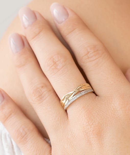 Anillo Circonitas Oro Bicolor de 18 Ktes.