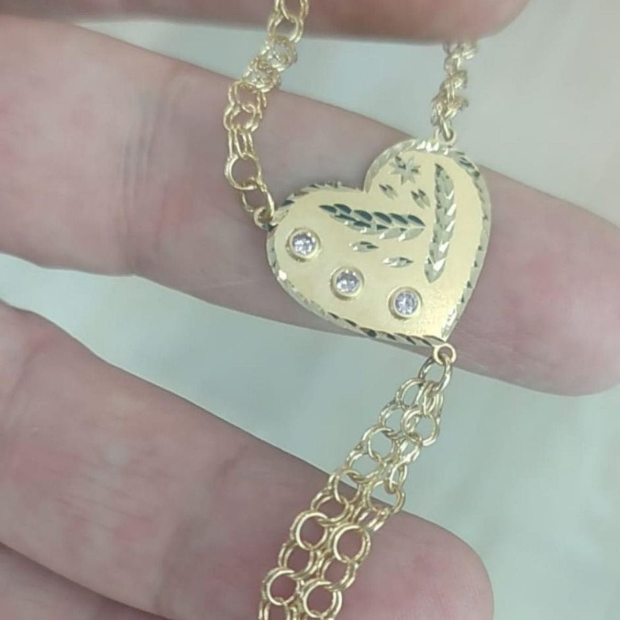 Pulsera Dedo/Manita Corazón Bebé en Oro 18 Ktes.