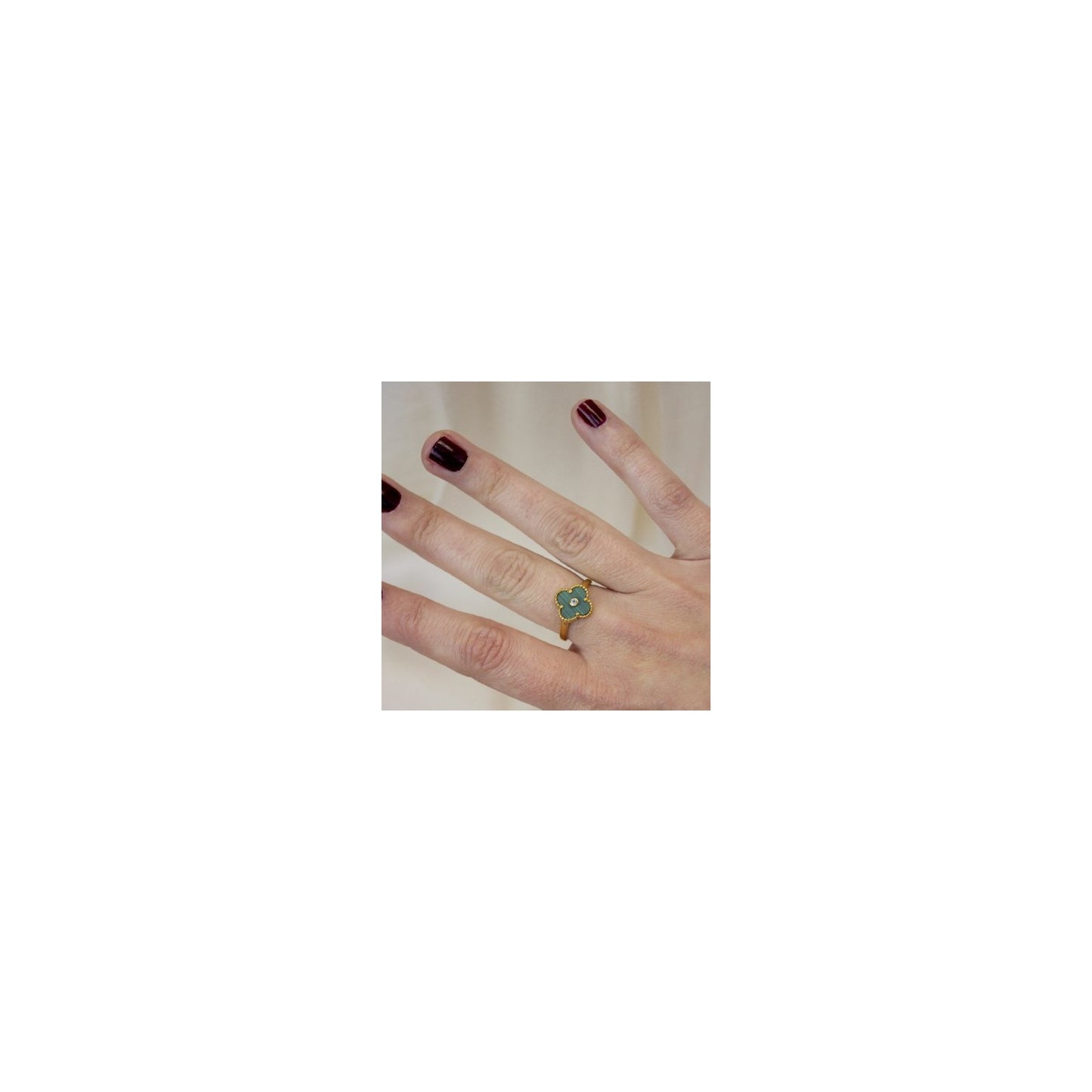 Anillo de Plata de Ley chapado en oro con flor en malaquita y circonita blanca