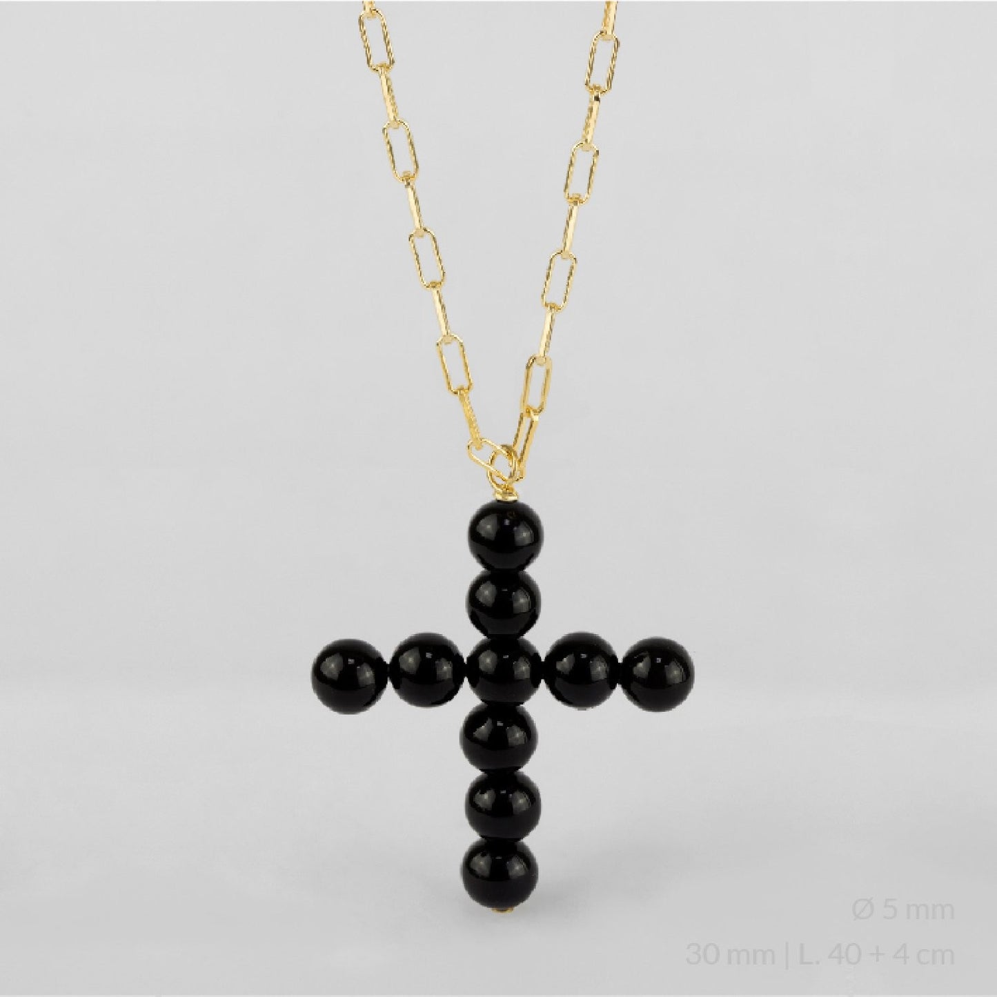 Gargantilla de Plata de Ley chapada en oro con cruz de perlas de color ónix.