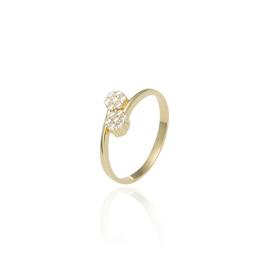 Anillo cruzado Circonitas en Oro de 18 Ktes.