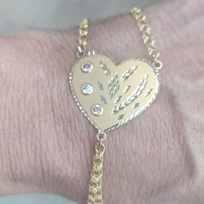 Pulsera Dedo/Manita Corazón Mujer en Oro 18 Ktes.