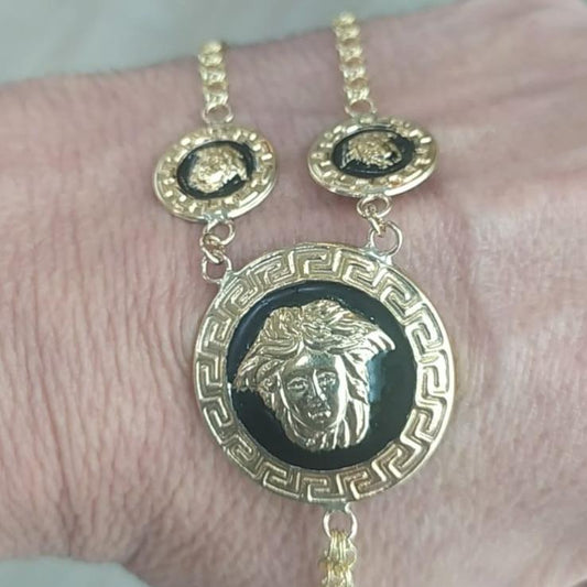 Pulsera Dedo/Manita Mujer tipo Versace 3 Medallas en Oro 18 Ktes.