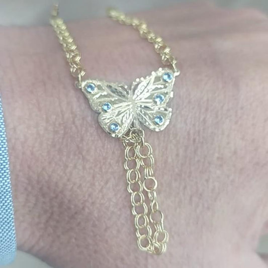 Pulsera Dedo/Manita Mariposa Azul Bebé en Oro 18 Ktes.