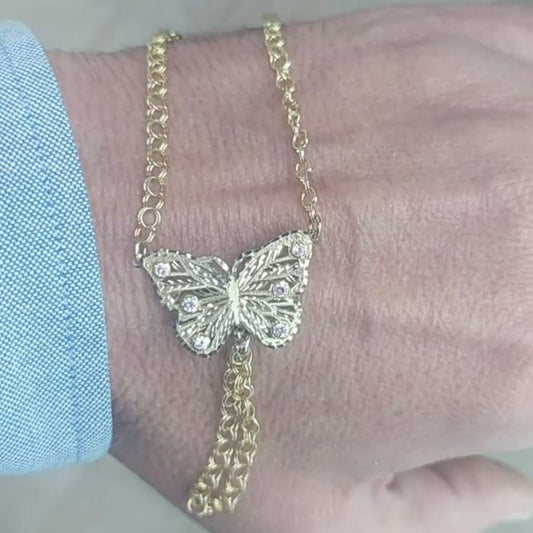Pulsera Dedo/Manita Mariposa Niña en Oro 18 Ktes.