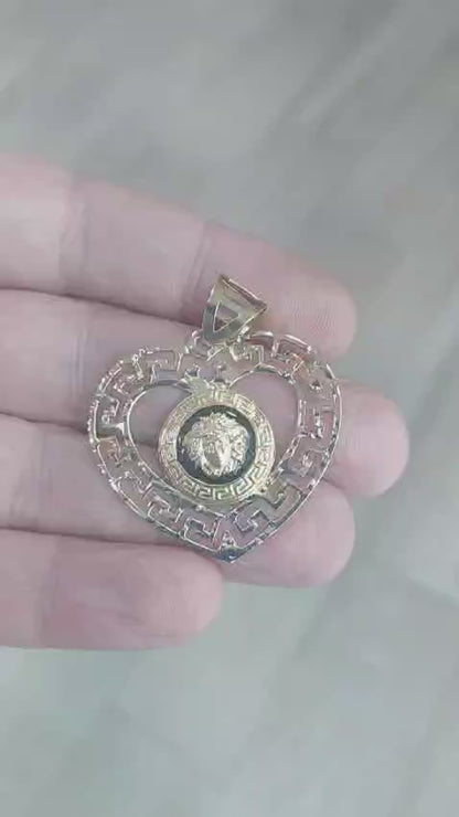 Colgante tipo Versace Corazón Grecas en Oro 18 Ktes.